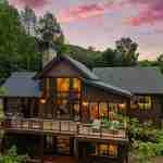 living-stone-–-north-haven-rustic-–-creston-–-black-mountain-nc-–-custom-home-–-exterior-twilight-aerial-rear-–-18