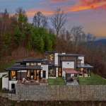 living-stone-–-stoneridge-haven-–-laurel-ridge-farms-–-waynesville-nc-–-custom-home-–-exterior-aerial-dusk-mountain-view-–-03