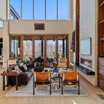 living-stone-–-stoneridge-haven-–-laurel-ridge-farms-–-waynesville-nc-–-custom-home-–-great-room-fireplace-floor-ceiling-windows-–-14