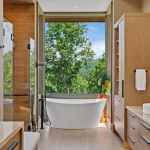 living-stone-–-stoneridge-haven-–-waynesville-nc-–-custom-home-–-primary-bath-soaking-tub-view-–-02