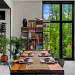 living-stone-–-wandering-oaks-modern-–-asheville-nc-–-custom-home-–-dining-room-wood-table-wine-wall-forest-windows-–-08