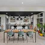 living-stone-–-wandering-oaks-modern-–-asheville-nc-–-custom-home-–-kitchen-dining-open-concept-barn-door-wine-rack-–-12
