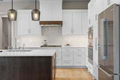 living-stone-–-daydream-rustic-modern-–-high-hickory-–-swannanoa-nc-–-custom-home-build-–-kitchen-white-cabinetry-island-–-08