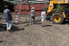 living-stone-crew-assembling-metal-building-frame-02