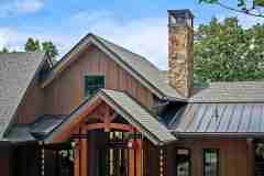 living-stone-–-north-haven-rustic-–-creston-–-black-mountain-nc-–-custom-home-–-exterior-roofline-stone-chimney-–-35