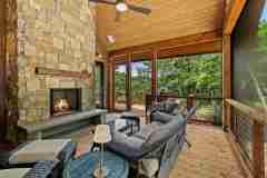 living-stone-–-north-haven-rustic-–-creston-–-black-mountain-nc-–-custom-home-–-screened-porch-stone-fireplace-–-26