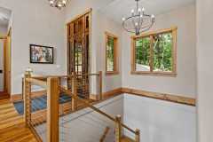 living-stone-–-north-haven-rustic-–-creston-–-black-mountain-nc-–-custom-home-–-staircase-landing-cable-railing-–-34