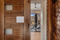 living-stone-–-stoneridge-haven-–-laurel-ridge-farms-–-waynesville-nc-–-custom-home-–-home-gym-barn-door-wood-accent-wall-–-17