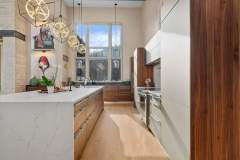 living-stone-–-stoneridge-haven-–-laurel-ridge-farms-–-waynesville-nc-–-custom-home-–-kitchen-walnut-cabinetry-island-pendants-–-08
