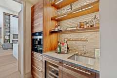 living-stone-–-stoneridge-haven-–-laurel-ridge-farms-–-waynesville-nc-–-custom-home-–-wet-bar-walnut-cabinetry-open-shelving-–-10