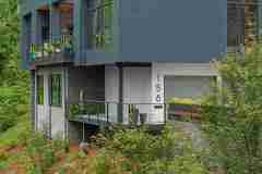 living-stone-–-wandering-oaks-modern-–-asheville-nc-–-custom-home-–-exterior-entry-balcony-drone-–-01