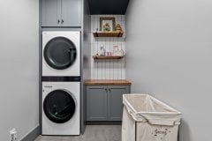 living-stone-–-wandering-oaks-modern-–-asheville-nc-–-custom-home-–-laundry-room-stacked-washer-dryer-butcher-block-–-17