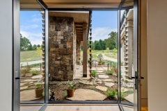 living-stone-–-waterfall-overlook-–-hendersonville-nc-–-custom-home-–-entry-foyer-stone-column-courtyard-–-12