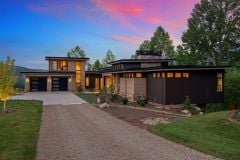 living-stone-–-waterfall-overlook-–-hendersonville-nc-–-custom-home-–-exterior-twilight-two-car-garage-–-24