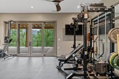 living-stone-–-waterfall-overlook-–-hendersonville-nc-–-custom-home-–-home-gym-fringe-sport-rack-–-14